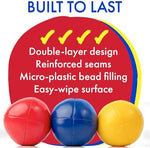 No bounce microbead filled juggling balls placed next to the instructional learning guide