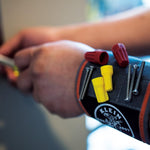 Klein Tools 55895 magnetic wristband showing adjustable hook-and-loop closure.