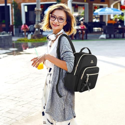 MATEIN small daypack purse displaying the external USB charging port feature