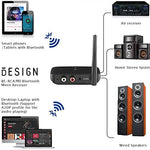 Besign compact wireless audio receiver placed next to modern home theater speakers for size reference