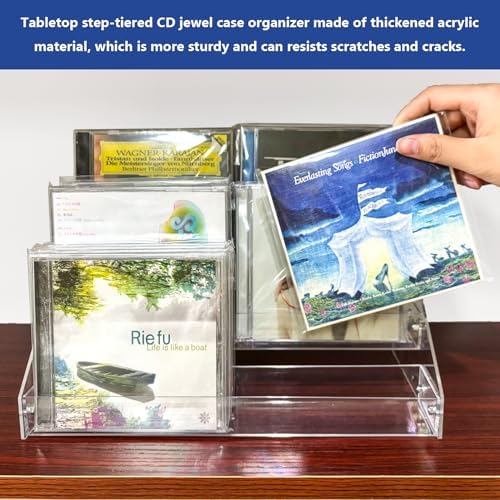 Close up of raised front shelf lip securing standard CD cases