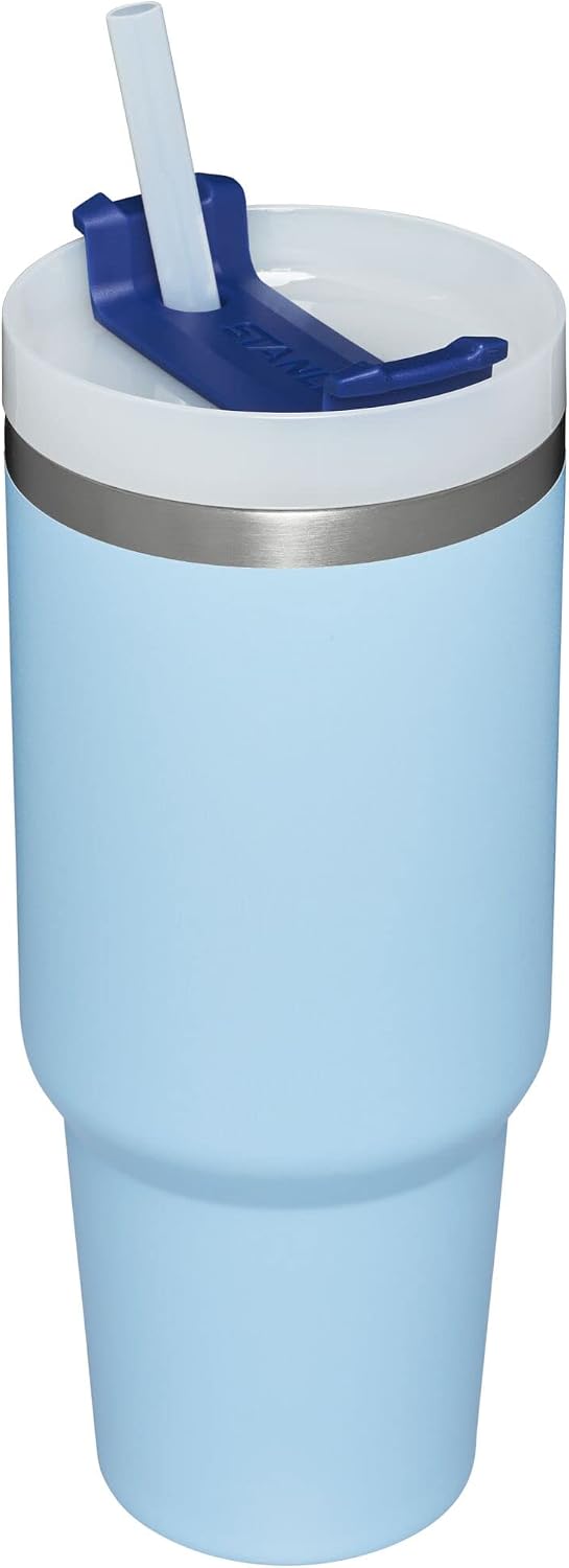 Stanley vacuum insulated tumbler with three position rotating lid and reusable straw.