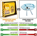 Toddler using construction plate and tractor utensils at mealtime