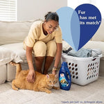 Suavitel pet hair repellent conditioner being poured for laundry use