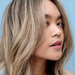 Close up of Bondbar hair lightener kit instructions and components