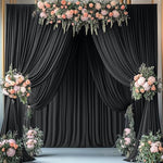 Two five feet by ten feet black fabric panels arranged seamlessly for a wedding stage background