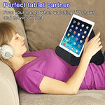 Side profile of Samhousing cushion stand highlighting the built-in accessory storage pocket holding reading glasses
