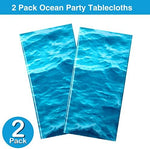 Irenare under the sea tablecloth pack of two laid out for an outdoor pool party setup.