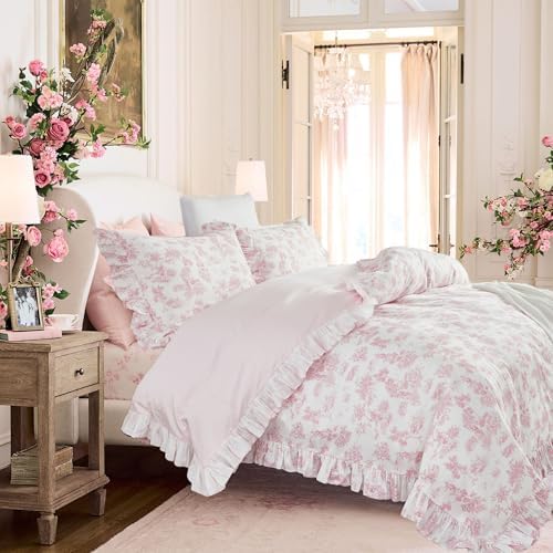 High angle shot of the complete three pieces cottagecore pink bedding set neatly laid out.