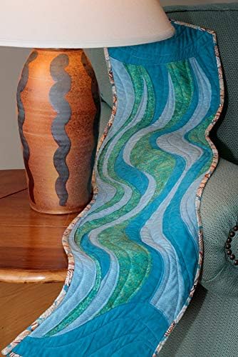 Quilting pattern book pages displaying wiggles and waves designs