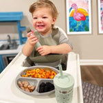 Close up of Elk and Friends stainless steel spoon and fork designed for toddlers