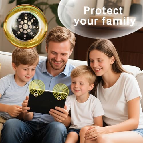 Close up view of golden EMF protection stickers on a mobile phone