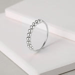 Side profile of minimalist sterling silver thumb ring