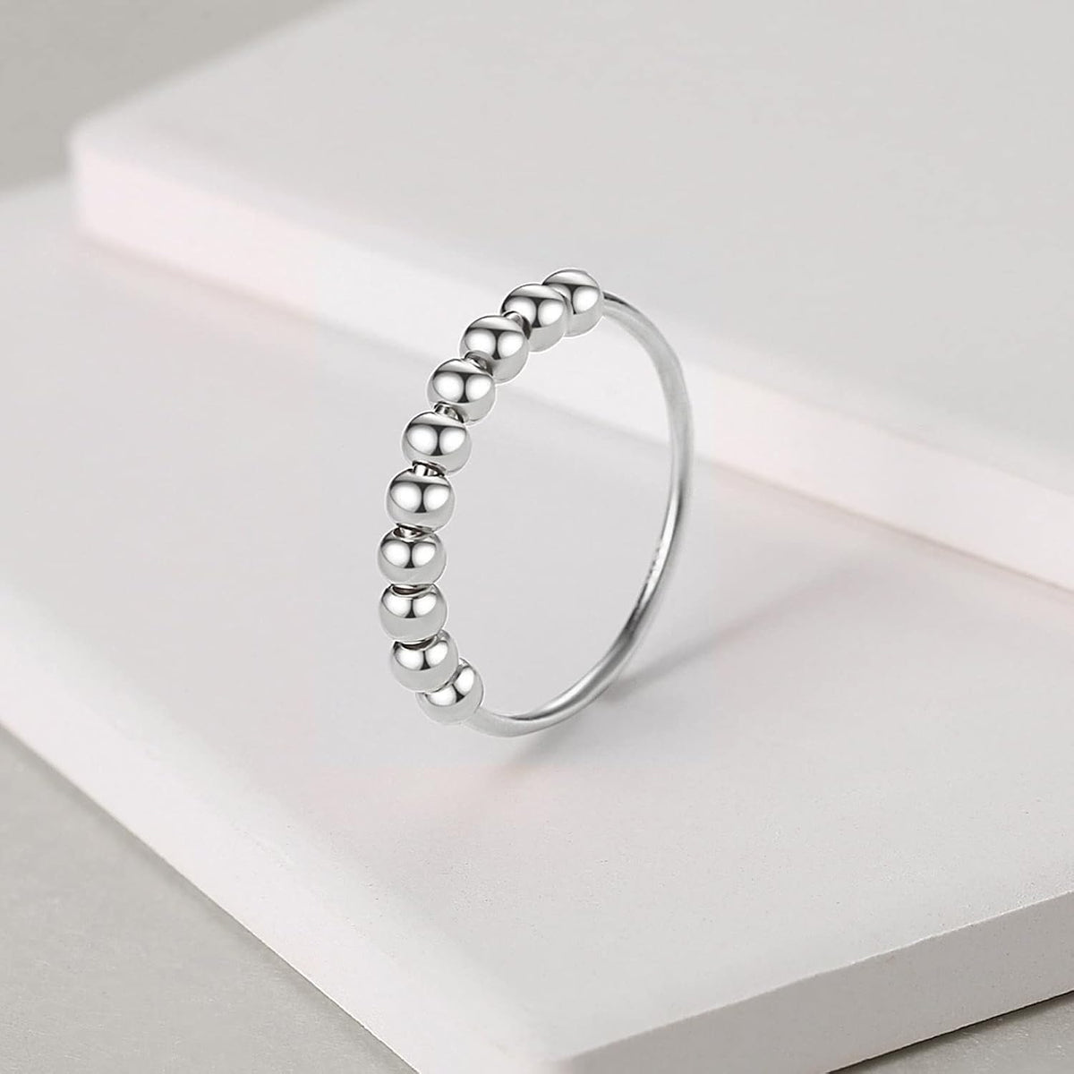 Side profile of minimalist sterling silver thumb ring