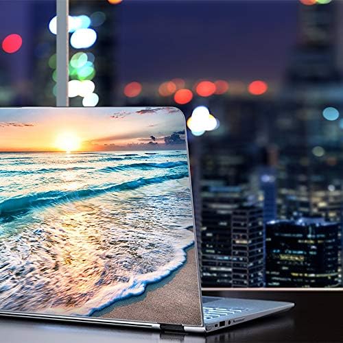 IT'S A SKIN sunset beach vinyl decal being smoothly applied onto an HP laptop cover.