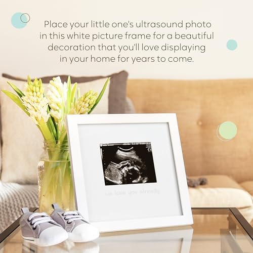 White wooden ultrasound keepsake frame showing the easel backing and triangle wall hanger for versatile nursery display.