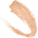 Maybelline concealer stick being blended into skin
