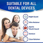 Clear aligner soaking in blue effervescent Dental Duty cleaning solution