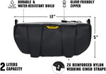 Reflective safety stripes on black motorcycle handlebar bag in low light