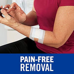 Nexcare blue surgical tape for sensitive skin being easily torn by hand without scissors.