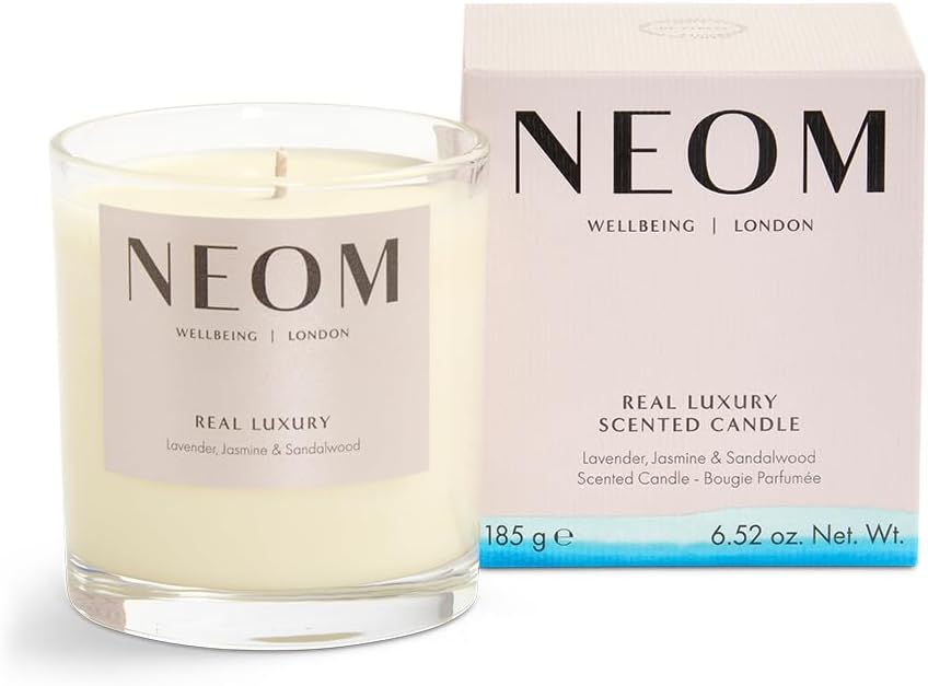 Neom Real Luxury Scented Candle front view featuring glass jar and label
