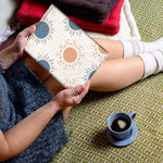 Side profile of slim bohemian e-reader sleeve