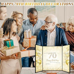 Folded triptych design of Dagelar 70th anniversary card