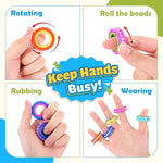 Silent tactile fidget ring being worn on a finger demonstrating the smooth rotating action.