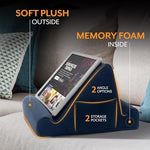 Brookstone memory foam stand being used with a Kindle e-reader for hands-free reading in bed.