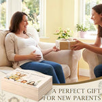 Open view of wooden baby keepsake box with storage compartments