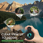 Close up of Ayraviio 12x60 monocular lens and gold accents