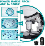 Close up of Esslnb microscope mechanical stage and specimen clips