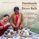 Fluff Ewes wool balls in a gray linen storage bag for sustainable laundry