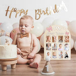 Aukolass baby milestone tracking wooden board hanging on a nursery wall