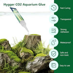 Close up view of the applicator nozzle on the aquascaping superglue tube for precise plant placement.