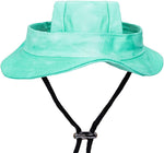 Bright pink GDQ pet sun hat displayed on a flat surface