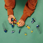 Kids assembling the 141 pieces of the authentic imported superhero playset