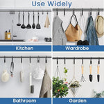 Installed view of the modern black metal curtain hooks inside a contemporary home bathroom setup.