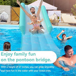 Adults enjoying the Wow Sports pontoon waterfall slide outdoors