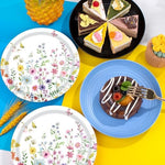 Spring summer garden party table setting with floral paper plates