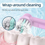 Pack of four replacement toothbrush heads with individual hygiene protective caps