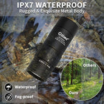 Olimt compact handheld monoscope angled view illustrating the multi-coated Extra-Low Dispersion glass lens.