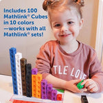 Close up view of two centimeter mathlink cubes being pressed and twisted together for fine motor development.