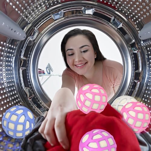 Four pack of extra large three inch anti static laundry balls arranged neatly on a clean surface.