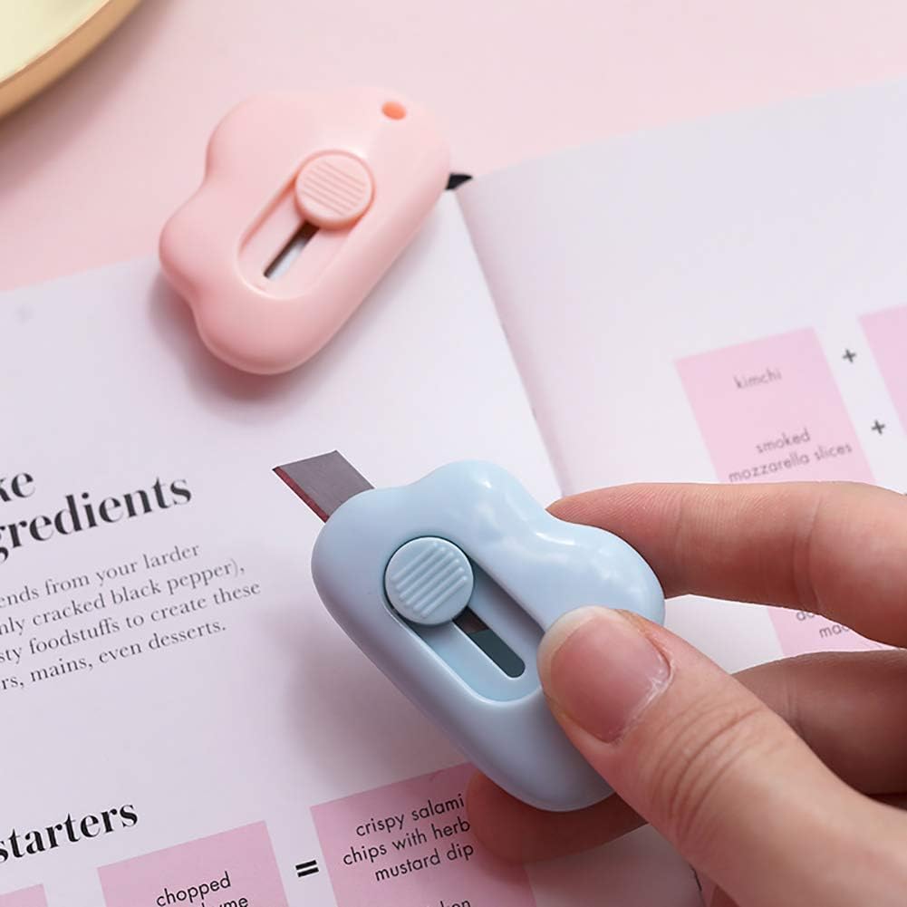 Mini cloud paper cutter highlighting the keychain hole feature