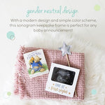Tiny Ideas white ultrasound picture frame styled on a nursery room shelf as elegant home decor.