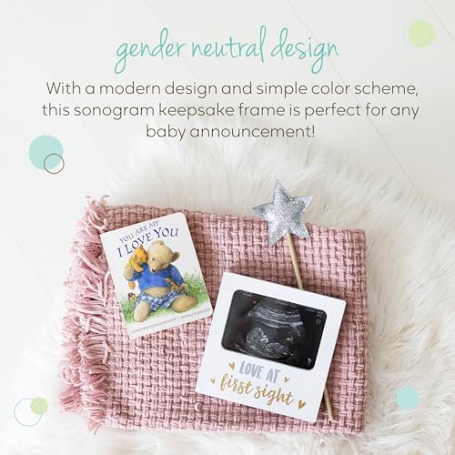 Tiny Ideas white ultrasound picture frame styled on a nursery room shelf as elegant home decor.