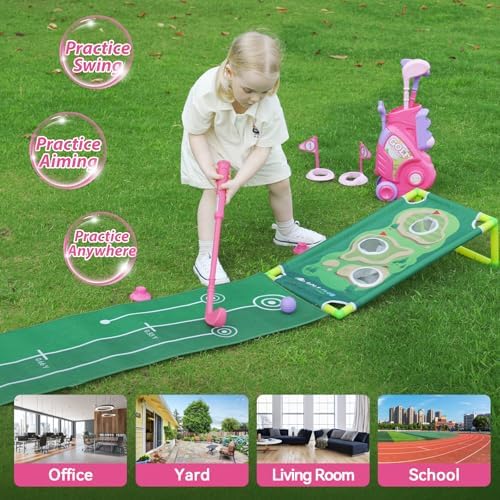 Child playing with Liberry pink golf set outdoors