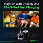 UGreen robotic type c power brick utilizing its magnetic feet to stand securely on a metal desk organizer.
