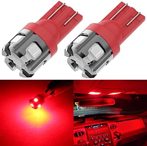 Phinlion red automotive light replacement bulb demonstrating its non-polarity wedge base for easy automotive installations.